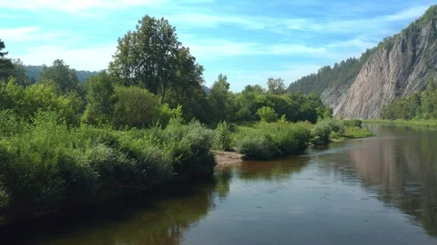 Flying low over the river along the coast. Stock Footage 114728221