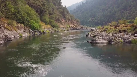 Flying low over a river Stock Footage 103758634