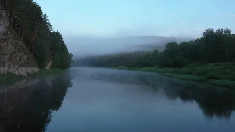 Flying low over river surface. Hazy morning over river. Agidel river Vídeo Stock 238685851