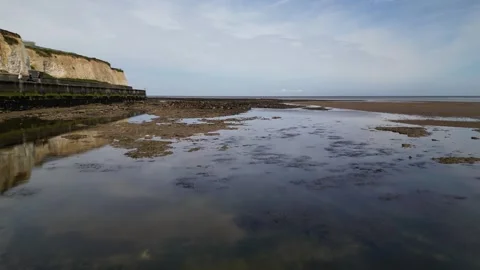 Flying low over rocky beach at epple bay kent Video stock 245305652