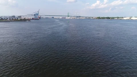 Flying  Low to Water Delaware River Philadelphia Stock Footage 77836402