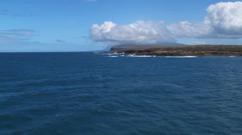 Flying up the lower coastline of Molokai Stock Footage 59521567