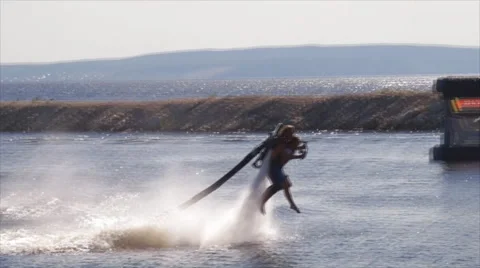 Flying man over water Stock Footage 62322685