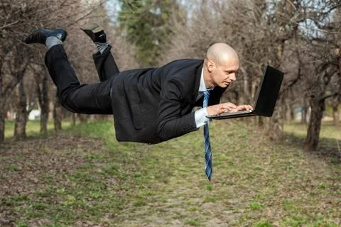 Flying man. Stock Photos