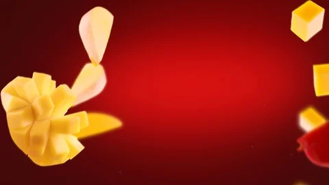 Flying of Mango and Slices in Deep Red Background Stock Footage 123500584