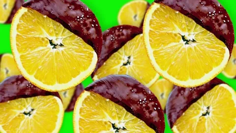 Flying many slices of oranges in chocolate on the green screen, isolated Stock Footage 163438281
