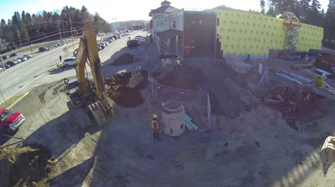 Flying by mechanical shovel on construction site Stock Footage 63941288