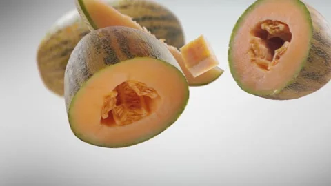 Flying Melon and Melons slices in Grey Background Stock Footage 229559952