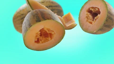 Flying Melon and Melons slices in Ice Blue, Turquoise Background Video stock 229561692