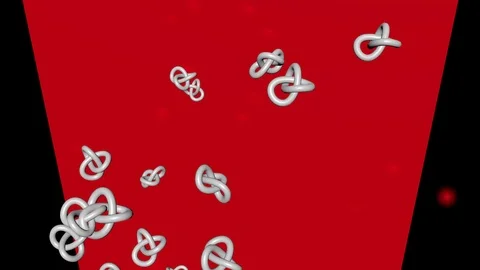 Flying metallic knotes on red and black background, blurry red lights. Node as a Stock Footage 122917466