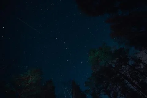 Flying meteorite in Asterism Big Eovsh in the constellation Ursa Major on dar Stock Photos