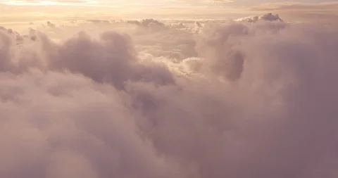 Flying in the midst of a dreamy purple cloudscape Stock Footage 117137042