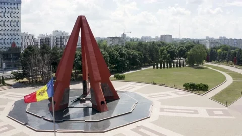 Flying moldovan flag in front of Eternity Memorial Complex in Chisinau. Stock Footage 201468231