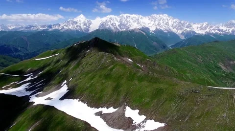 Flying mountain range valley 4k video. Caucasus Georgia green nature snow peak Stock Footage 68458998