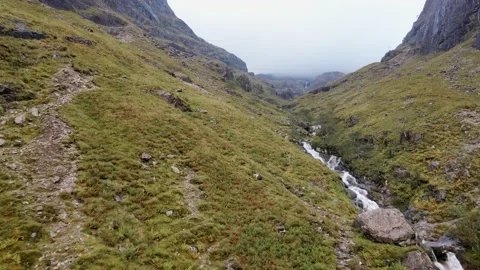 Flying up the mountain in Scotland Video stock 139814393
