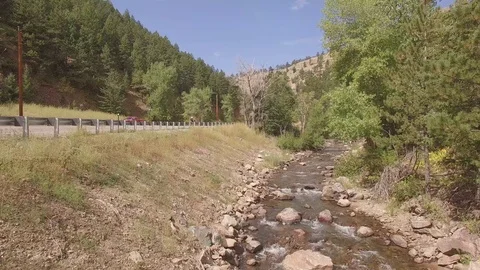 Flying Up Mountain Stream Stock Footage 100209589