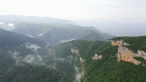 Flying in the mountains during the rain, the stunning wildlife of Russia Stock Footage 115726730