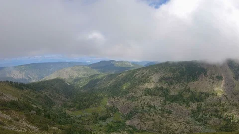 Flying in mountains Video stock 121599405