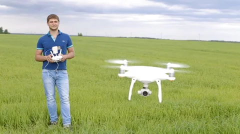 Flying a multicopter with transmitter Stock Footage 64078688