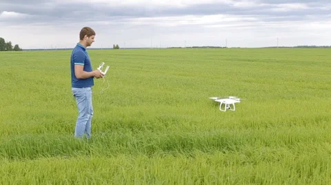 Flying a multicopter with transmitter Stock Footage 64079036