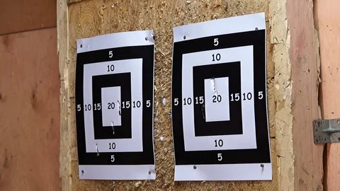 Flying nail. Man is throwing the nail. Tournament. Nail throwing Stock Footage 89285876