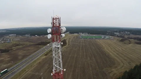 Flying near the cell tower mobile operator and the other transmitting signals Stock Footage 71275601