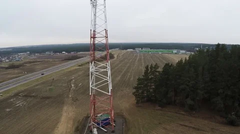 Flying near the cell tower mobile operator and the other transmitting signals Stock Footage 71275770