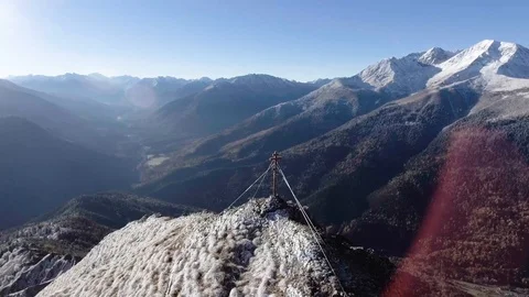 Flying near winter mountain range valley Aerial 4k video. Travel eco Tourism in Stock Footage 102039752