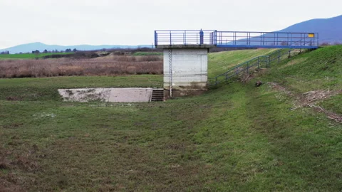 Flying next to riverside embarkment Stock Footage 231910340