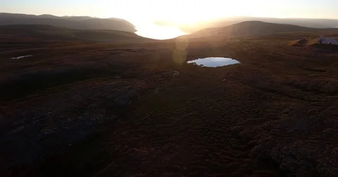 Flying into the North Cape sunset Stockbeeldmateriaal 70128544