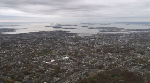 Flying north over Dorchester, Massachusetts, looking toward Boston Harbor. Shot Stock Footage 59134530