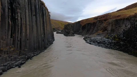 Flying North through Studlagil Canyon Video stock 130135016