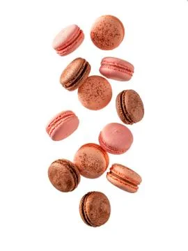 Flying or falling macarons, isolated on white Фото