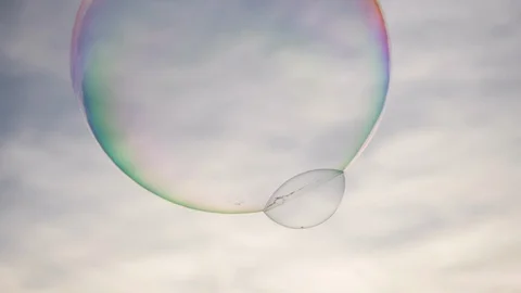 Flying or floating big soap bubble in park with castle sunset time Stock Footage 87693920