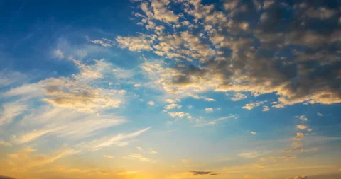 Flying orange clouds at sunset Stock Footage 138439780