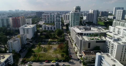 Flying out of Edgewater, Miami and into Biscayne Bay Stock Footage 147334653