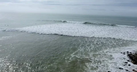 Flying out over surfer at C St surf spot Ventura, California Video stock 73099369