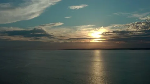 Flying out to sea sunset Video stock 146409217