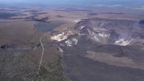 Flying Over an Active Volcano Crater in Hawaii Stock Footage 130359108