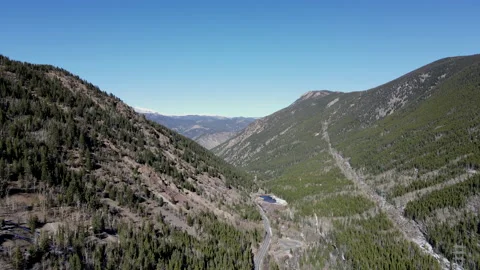 Flying over (aerial top view) Colorado mountains. Video stock 144771385