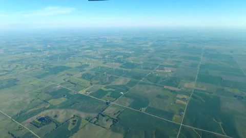 Flying over agricultural fields and wind farm Stock-Footage 169319008