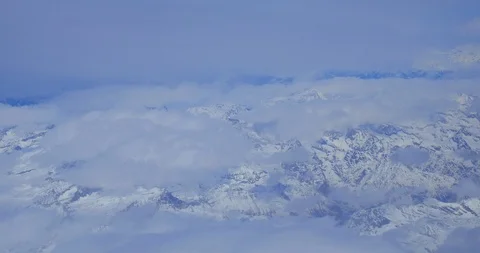 Flying over Alps mountains between Switzerland and Italy Video stock 86233134