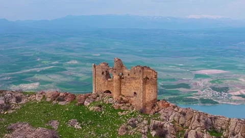 Flying Over an Ancient Monastery Revealing a Vast River and Mountain Landscape Stock-Footage 340910599