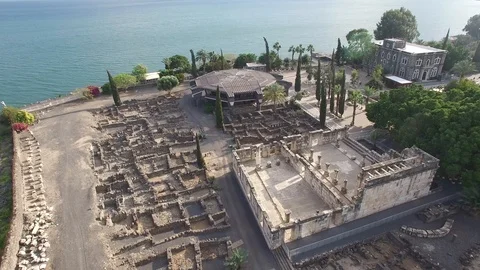 Flying over Ancient Synagogue and Octagonal Church at Capernaum. DJI-0009-09 Stock-Footage 104496704
