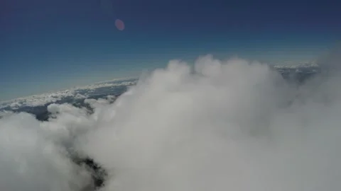 Flying over and through clouds Stock Footage 237403929