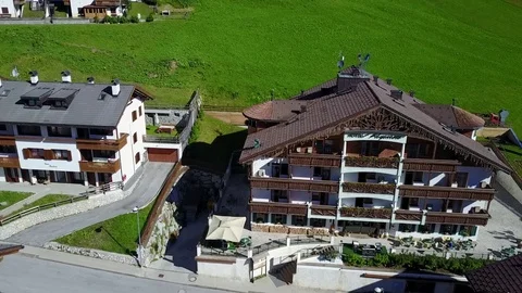 Flying over Arabba resort in the Dolomites Stock Footage