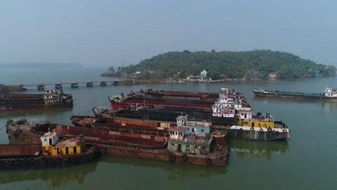 Flying over barges moored off the coast. Drone shot. 스톡 동영상 85667172