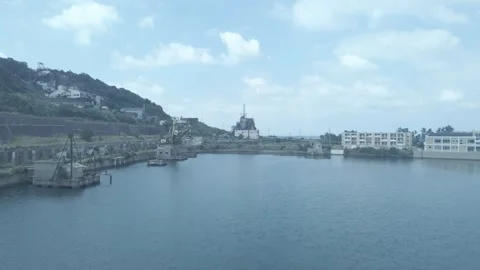 Flying over a bay on an island Stock Footage 293951853