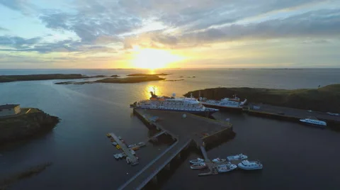 Flying over the bay at sunset Stock Footage 53460504