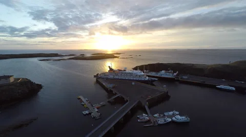 Flying over the bay at sunset Stock Footage 53460536